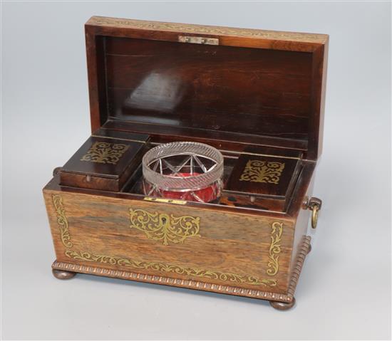A George IV brass inlaid rosewood tea caddy and associated sugar bowl length 31cm